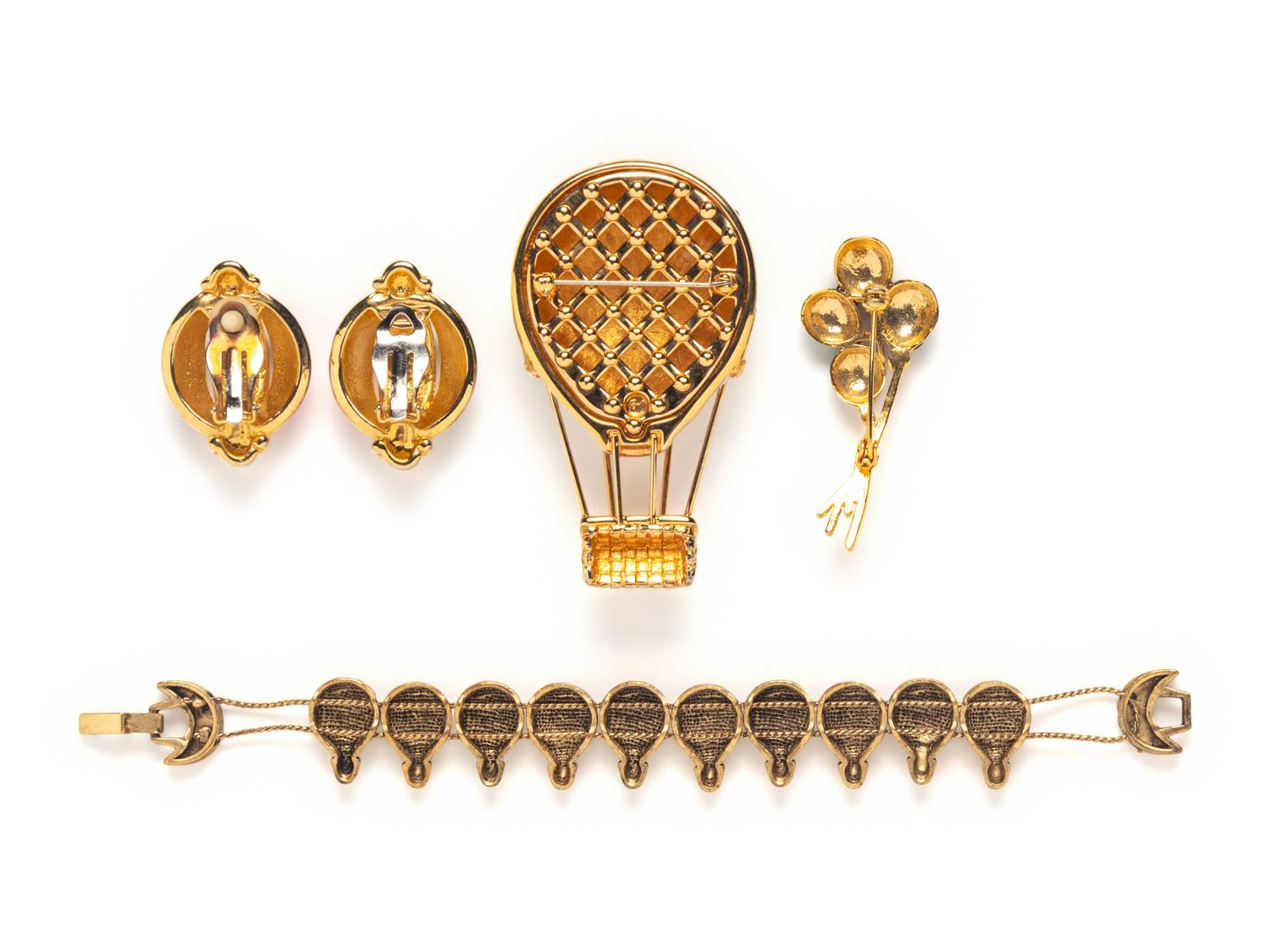 FOUR BALLOON-THEMED JEWELRY PIECES