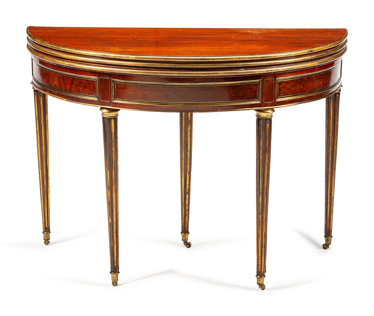 A Louis XVI Style Brass-Mounted Mahogany Triple-Top Demilune Games Table