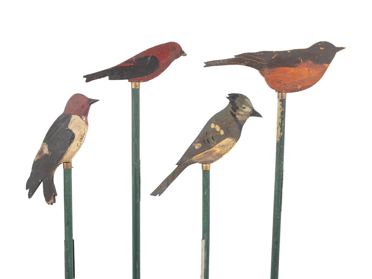 A Set of Four Joseph Dodson Carved and Painted Wooden Birds