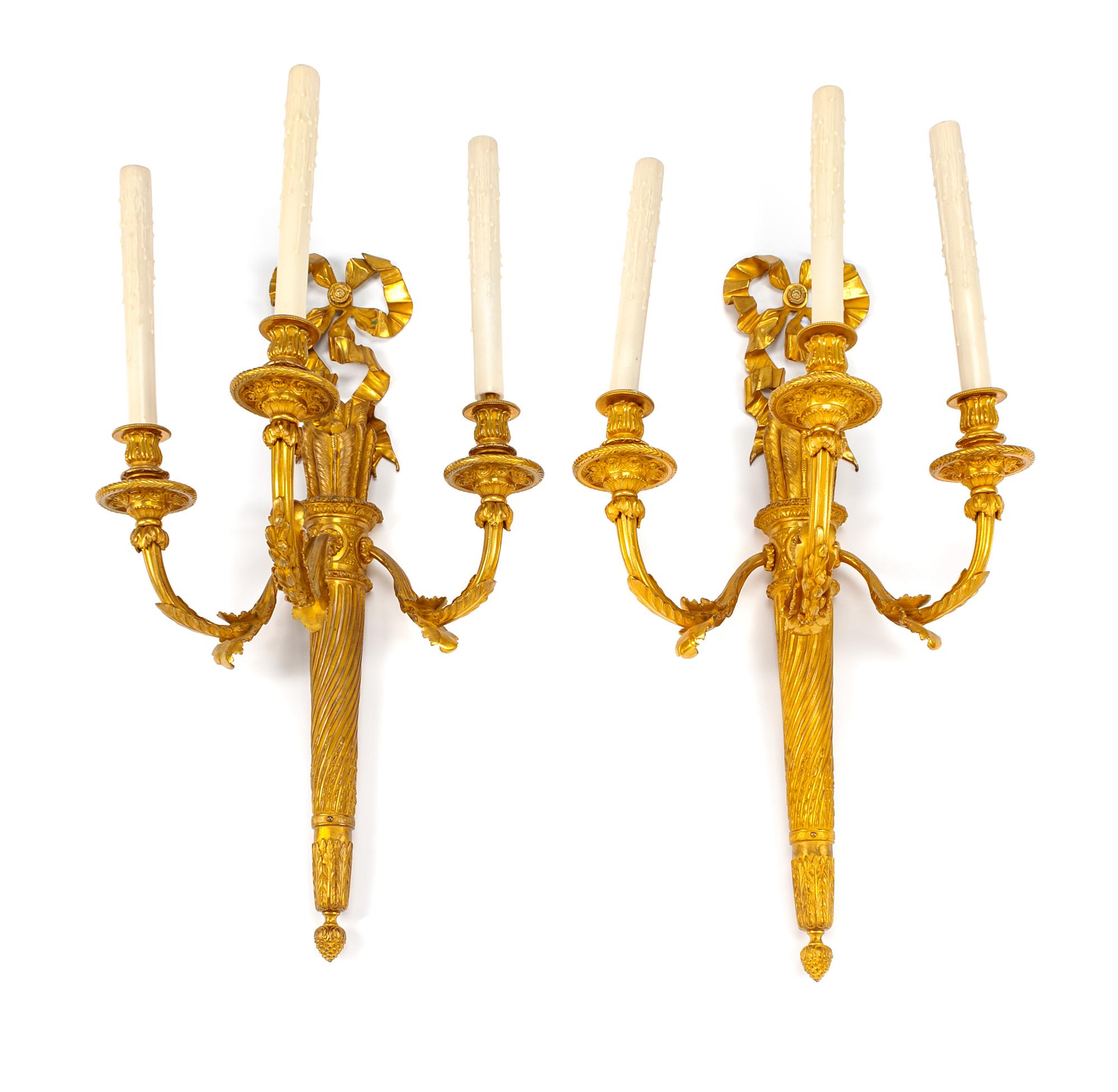 A Pair of Regence Style Gilt Bronze Three-Light Sconces