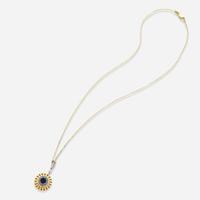 An 18K Yellow Gold Black Diamond and Diamond Pendant on a 14K Chain