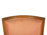 A Louis XVI Carved Walnut Bergère
