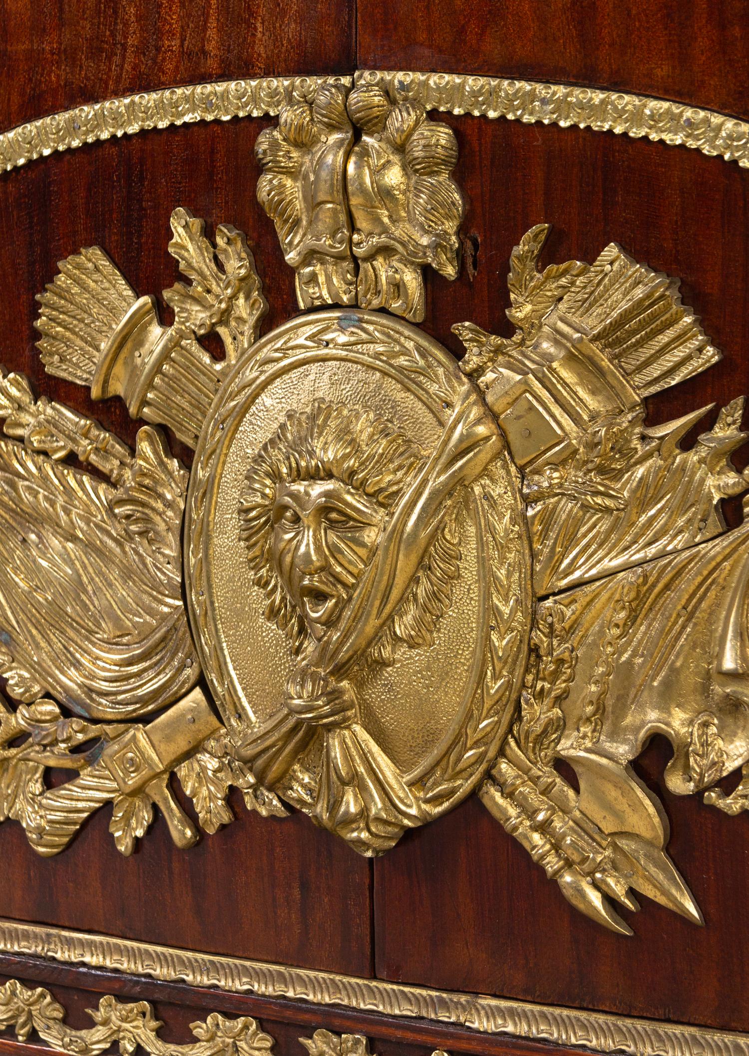 A Louis XVI Style Gilt Metal Mounted Mahogany Commode à Vantaux After the Model by Guillaume Benneman