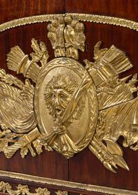 A Louis XVI Style Gilt Metal Mounted Mahogany Commode à Vantaux After the Model by Guillaume Benneman