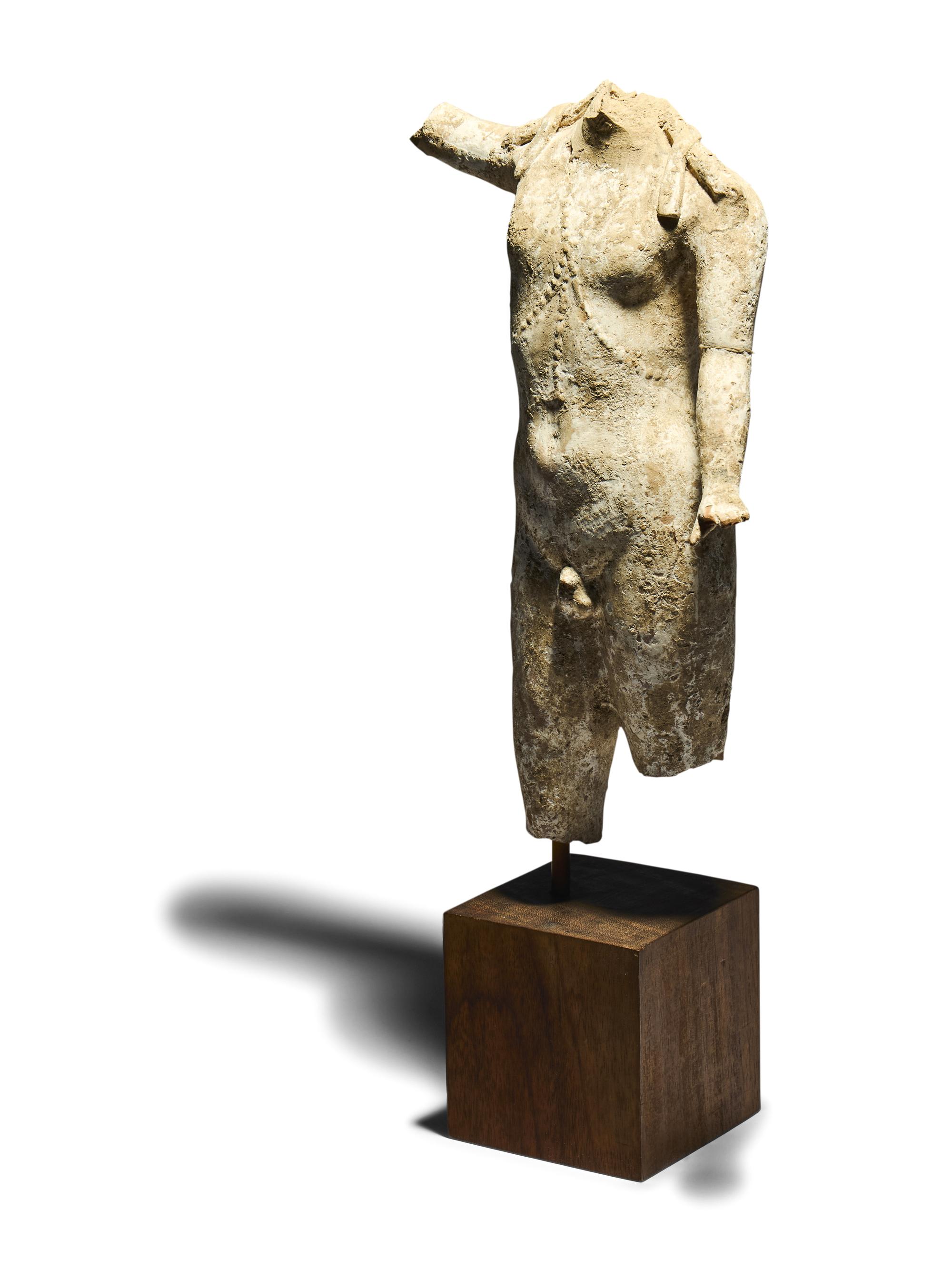 A Hellenistic Terracotta Torso of a Male Deity