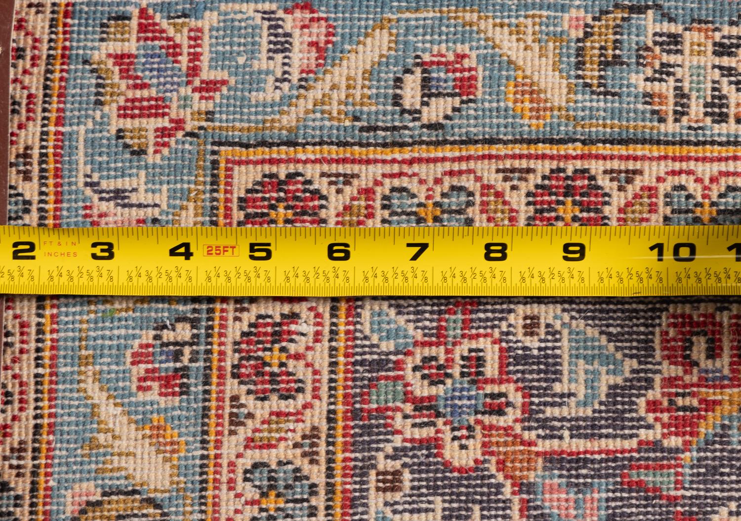 A Kashan Wool Rug