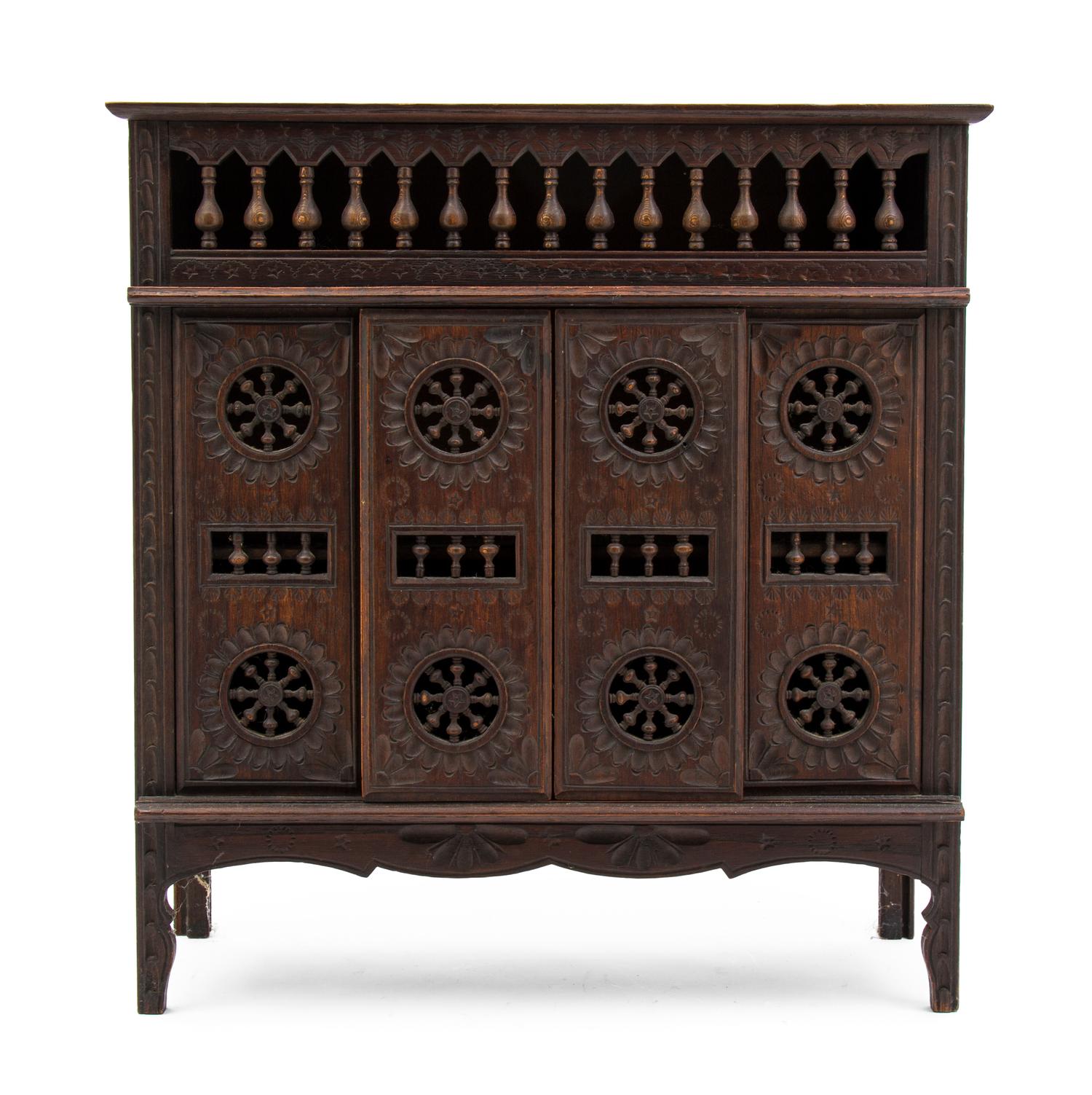 A Brittany Style Diminutive Mahogany Openwork Chest, Height 17 3/4 x width 16 7/8 x depth 6 1/4 inches.