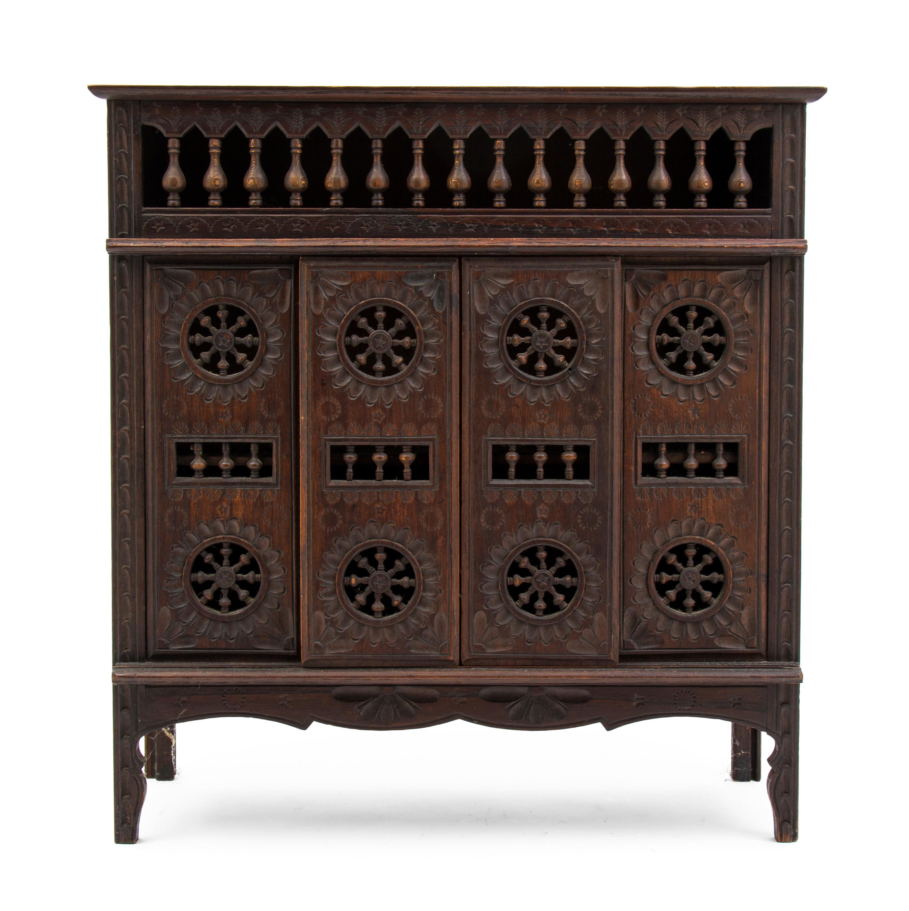 A Brittany Style Diminutive Mahogany Openwork Chest, Height 17 3/4 x width 16 7/8 x depth 6 1/4 inches.