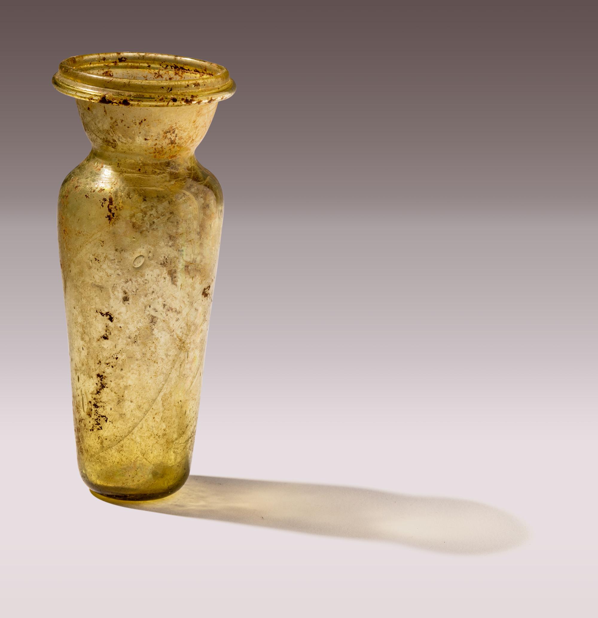 A Roman Yellow-Green Glass Amphoriskos