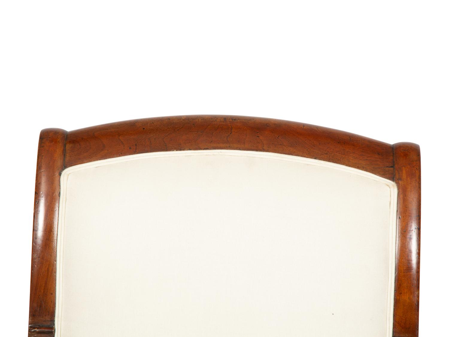 A Pair of French Walnut Fauteuils