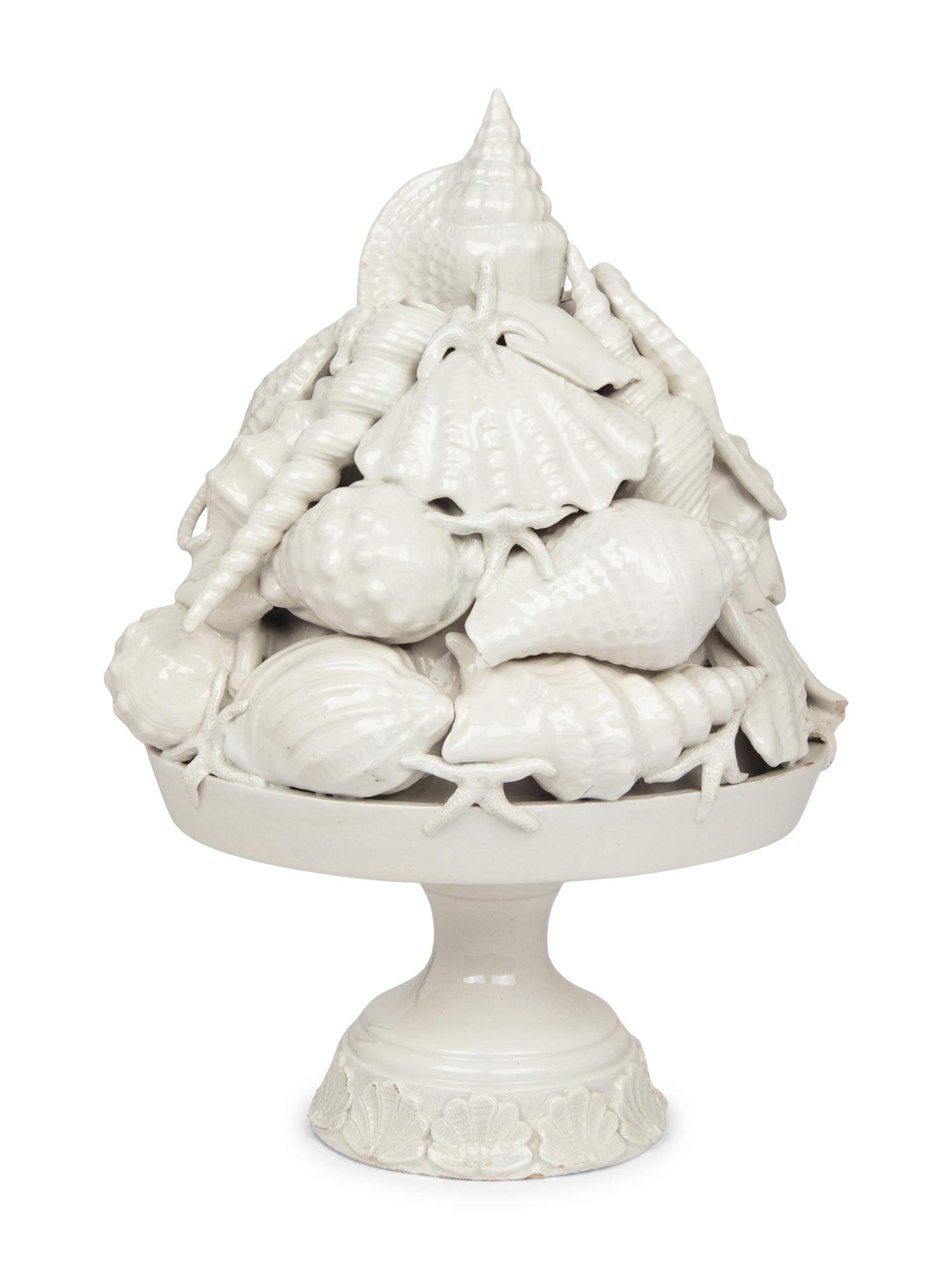 An Italian White Glazed Earthenware Centerpiece