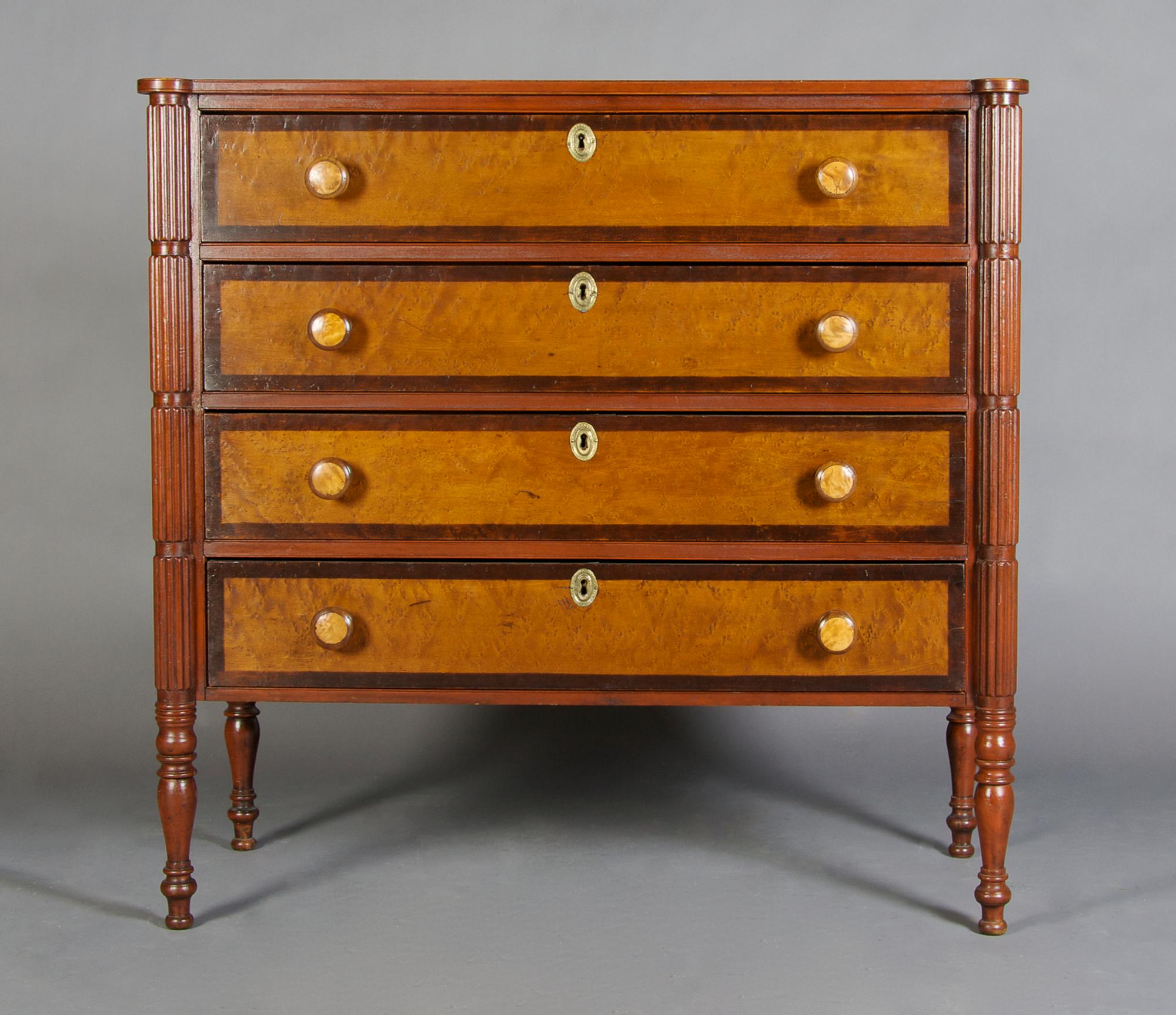 An American Regency Chest of Drawers, Height 39 1/2 x width 40 x depth 18 inches.