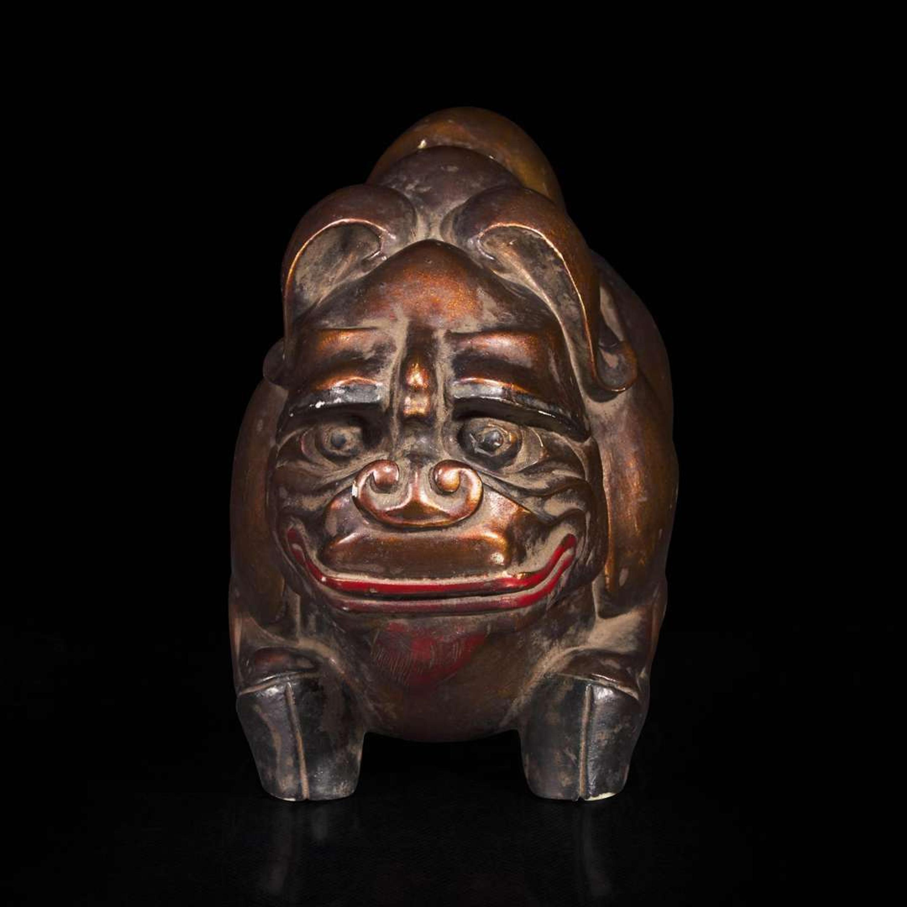 An unusual Chinese gilt-lacquered jade mythical beast 珍罕漆金玉雕瑞兽