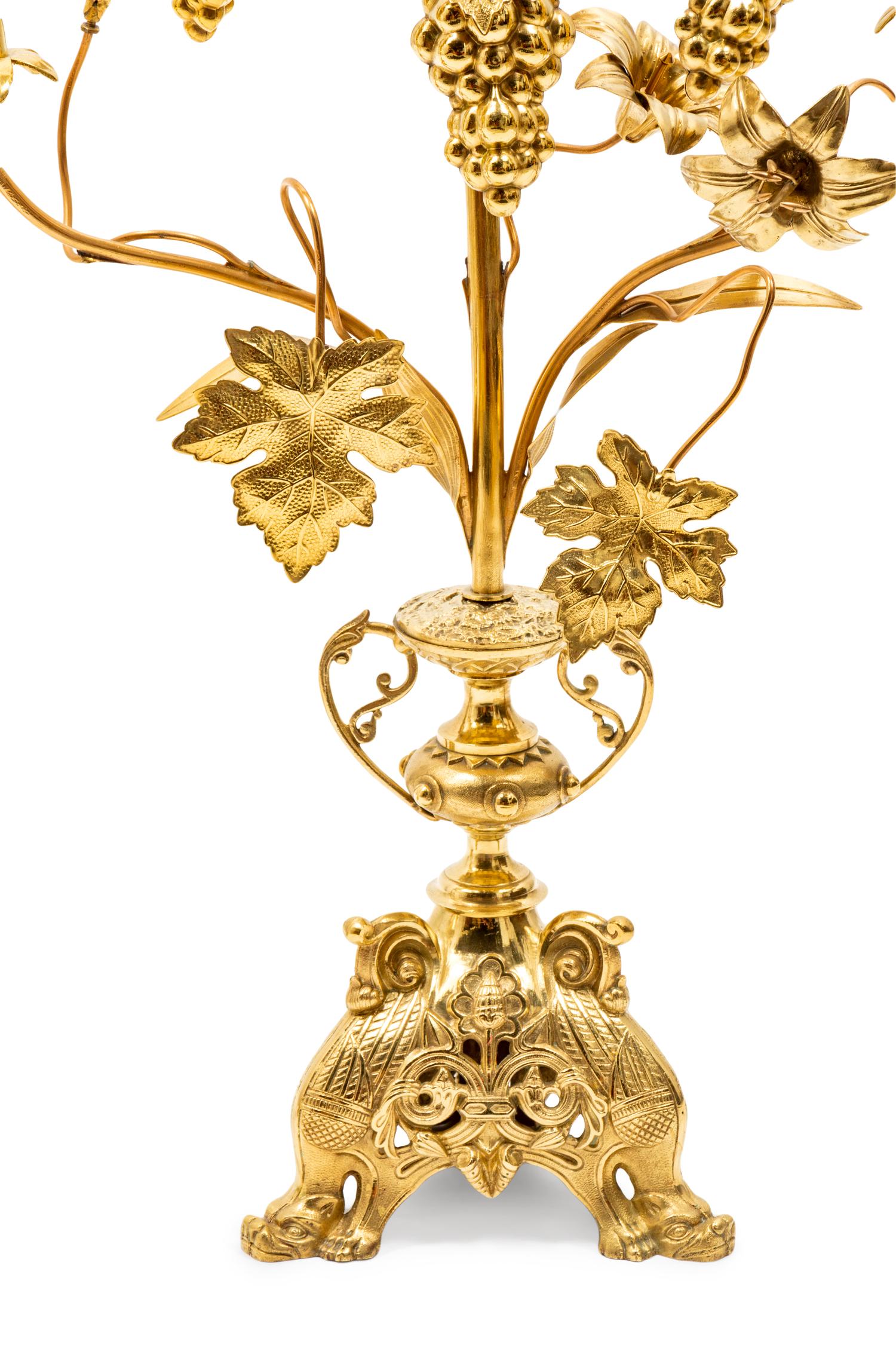 A Pair of Victorian Brass and Glass Seven-Light Candelabra