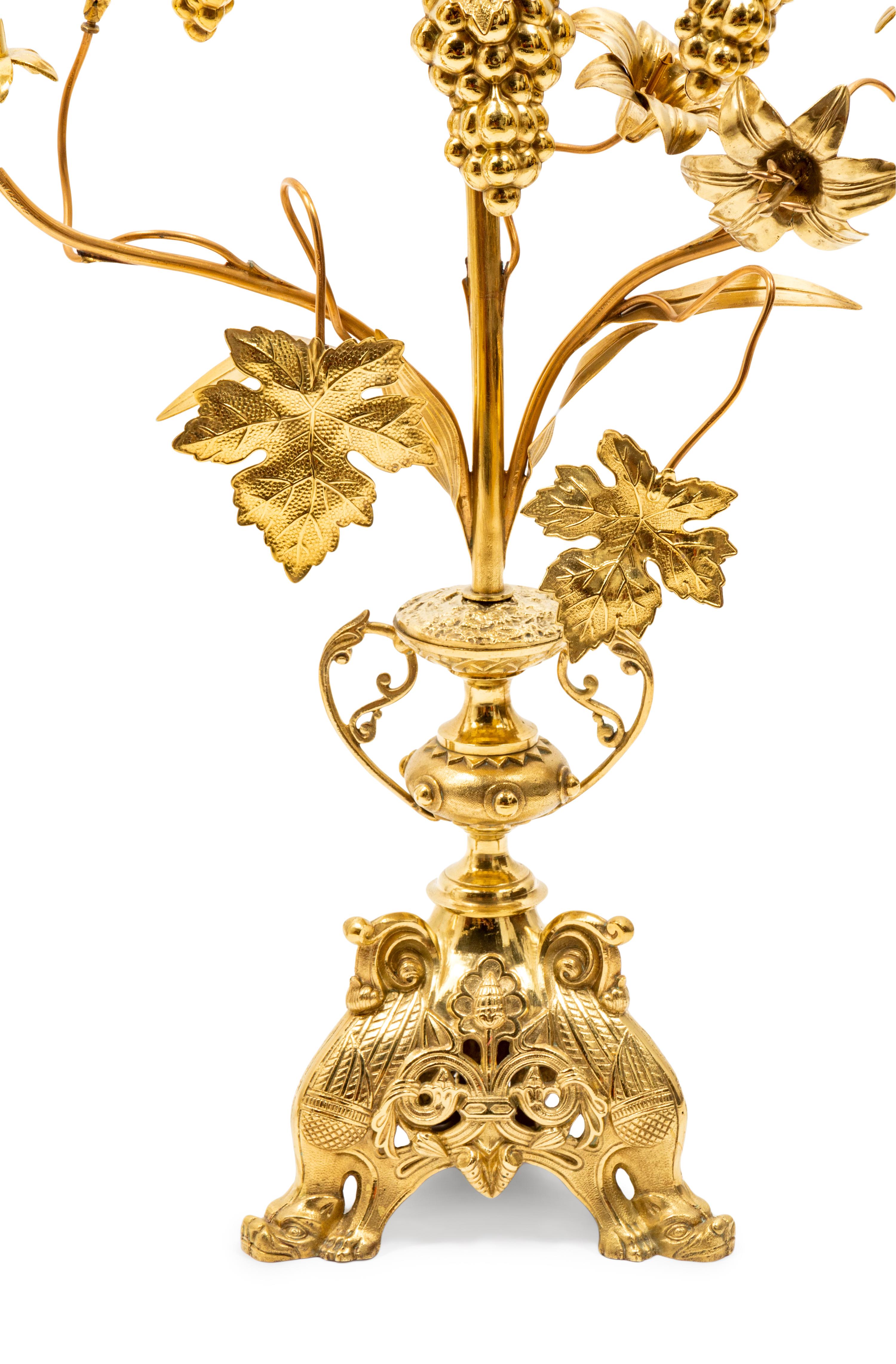 A Pair of Victorian Brass and Glass Seven-Light Candelabra