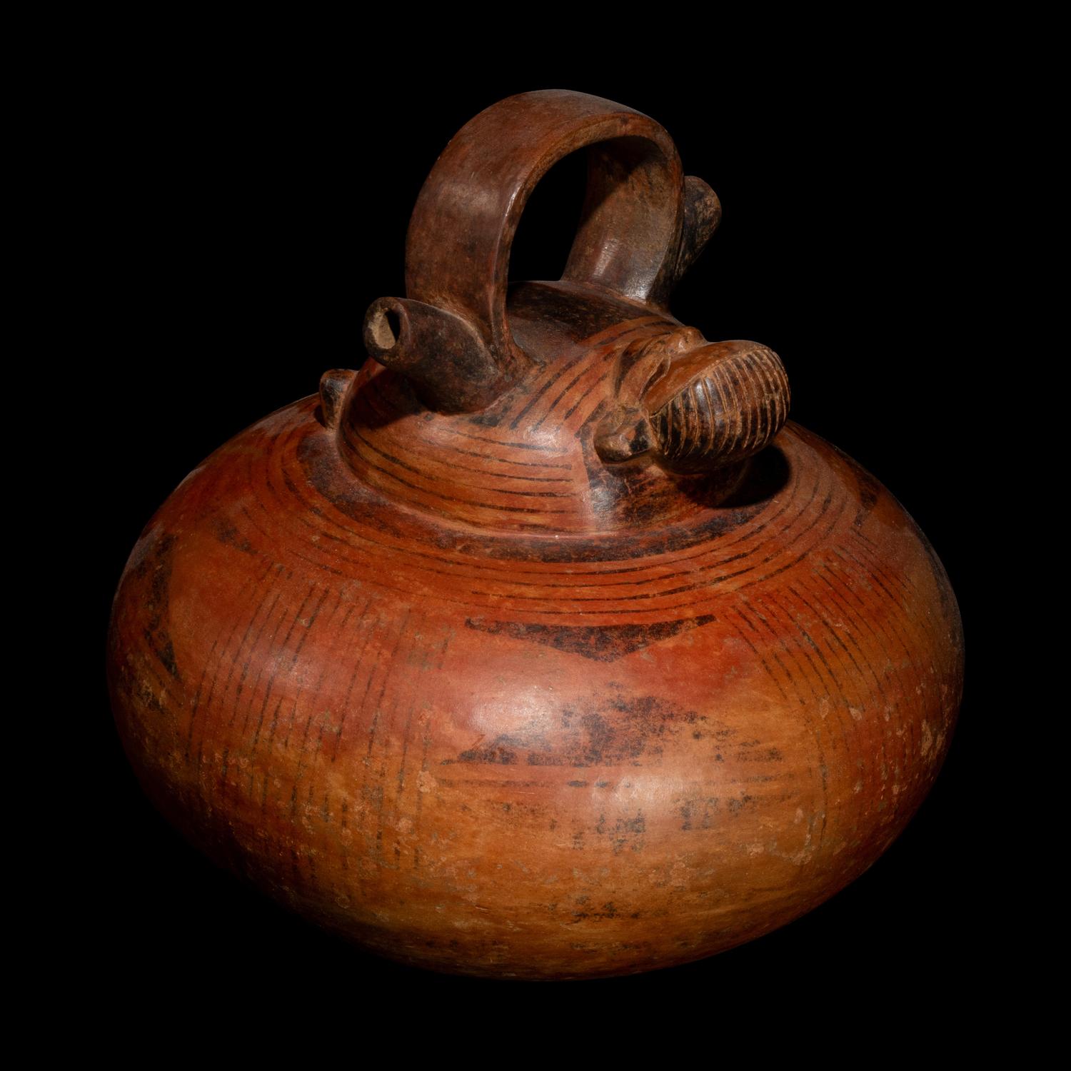 A Calima Redware Anthropomorphic Alcarraza