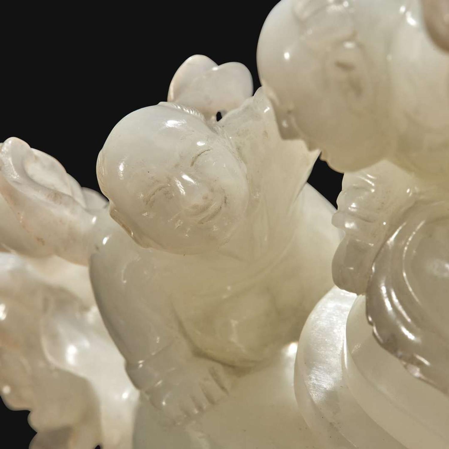 A Chinese carved white jade "Boys" vase and cover Qing Dynasty, 18th/early 19th Century