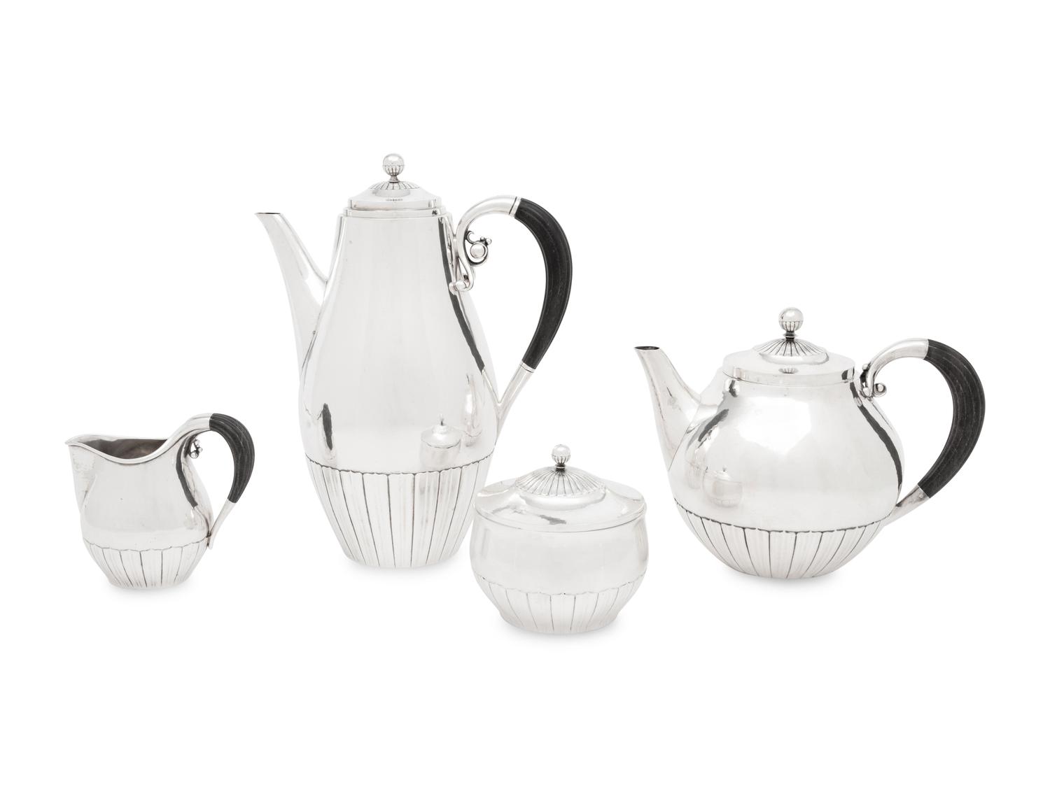 A Johan Rohde for Georg Jensen Cosmos Silver Four-Piece Tea Service