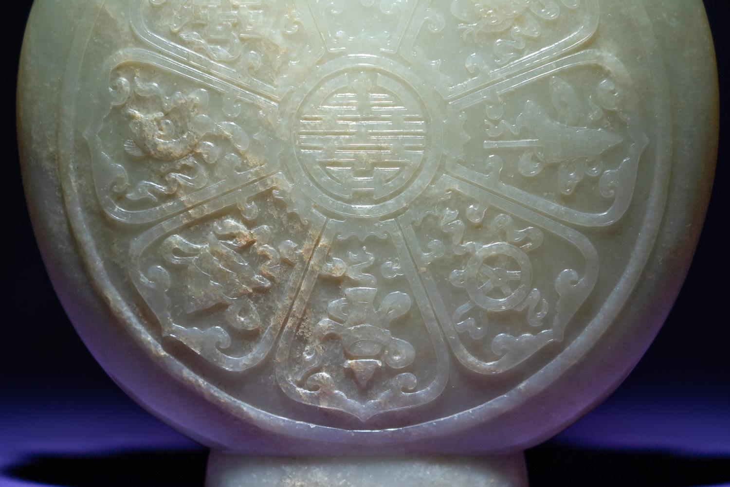 A Rare and Finely Carved Chinese White Jade Covered Vase