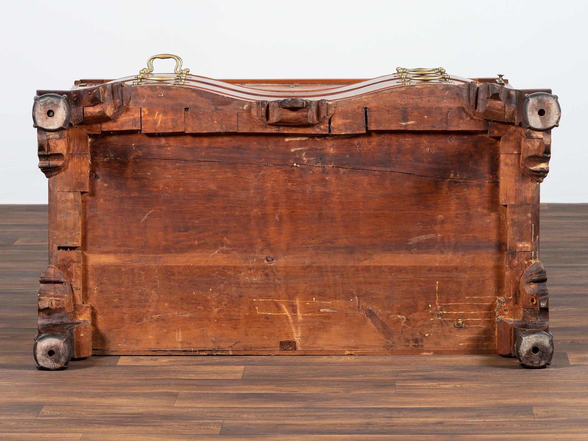A Chippendale Carved Mahogany Reverse Serpentine Block-Front Desk