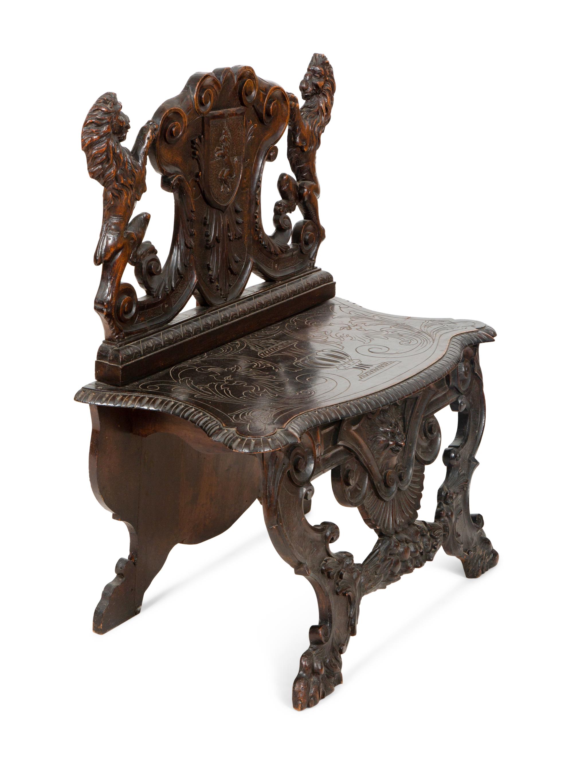A Jacobean Style Carved Oak Bench with Armorial and Lion Carved Back