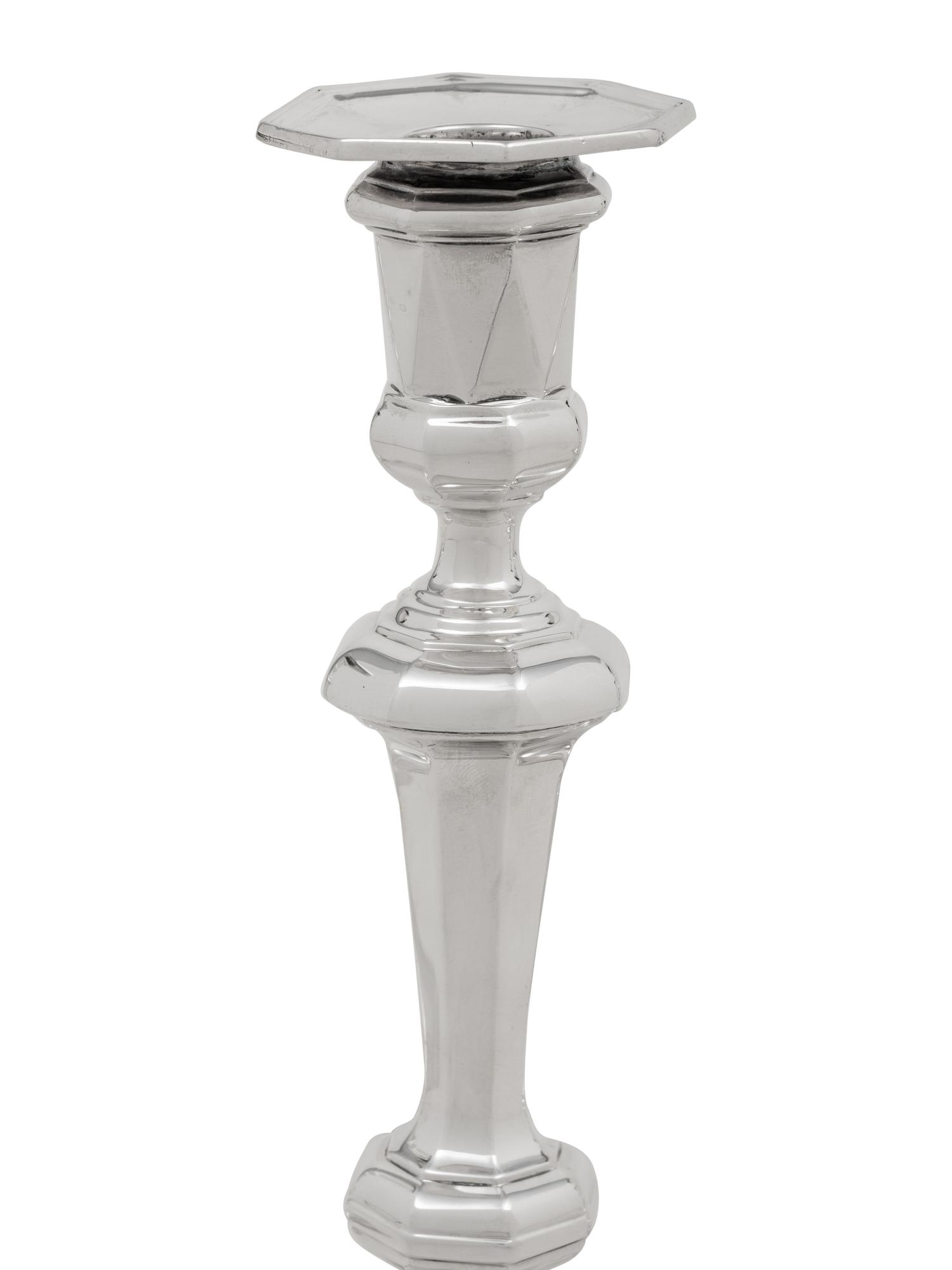 A Set of Four English Britannia Silver Candlesticks