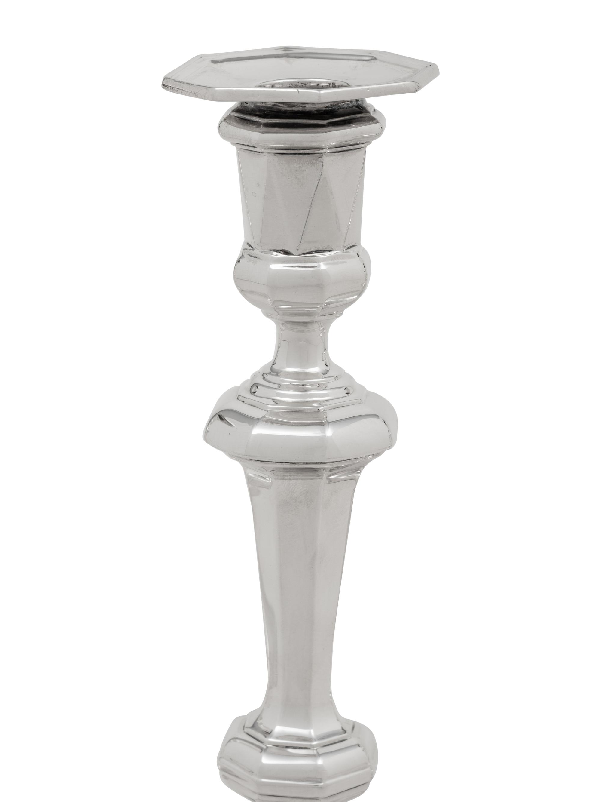 A Set of Four English Britannia Silver Candlesticks