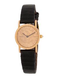 CORUM, 18K YELLOW GOLD US $5 COIN WRISTWATCH
