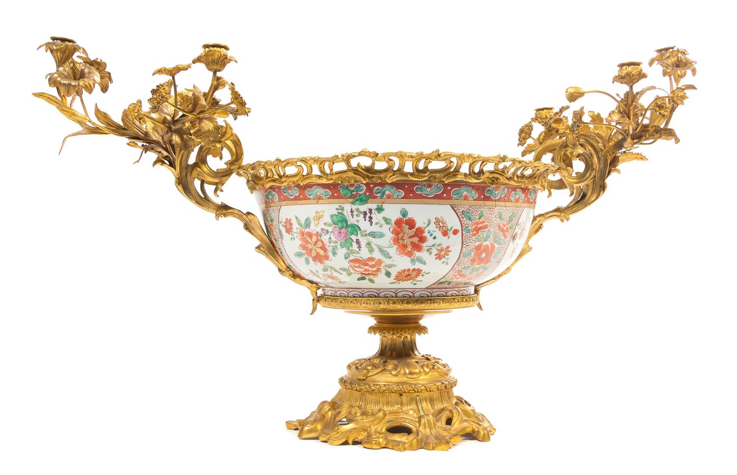 A French Gilt Bronze Mounted Japanese Porcelain Centerpiece Bowl Height 21 x width over candelabra 36 inches.