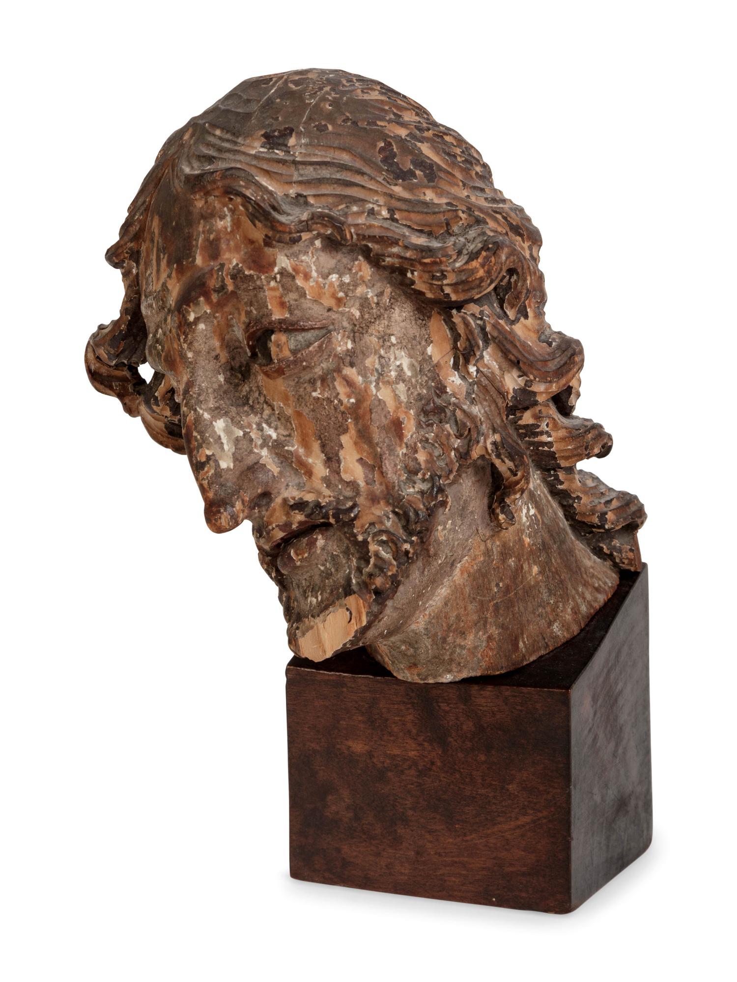 A Continental Carved and Polychromed Bust of a Saint
