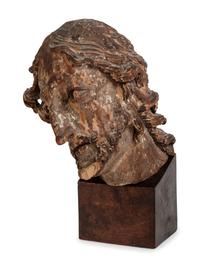 A Continental Carved and Polychromed Bust of a Saint