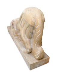 A Pair of Carved Marble Crouching Dogs — 20TH CENTURY