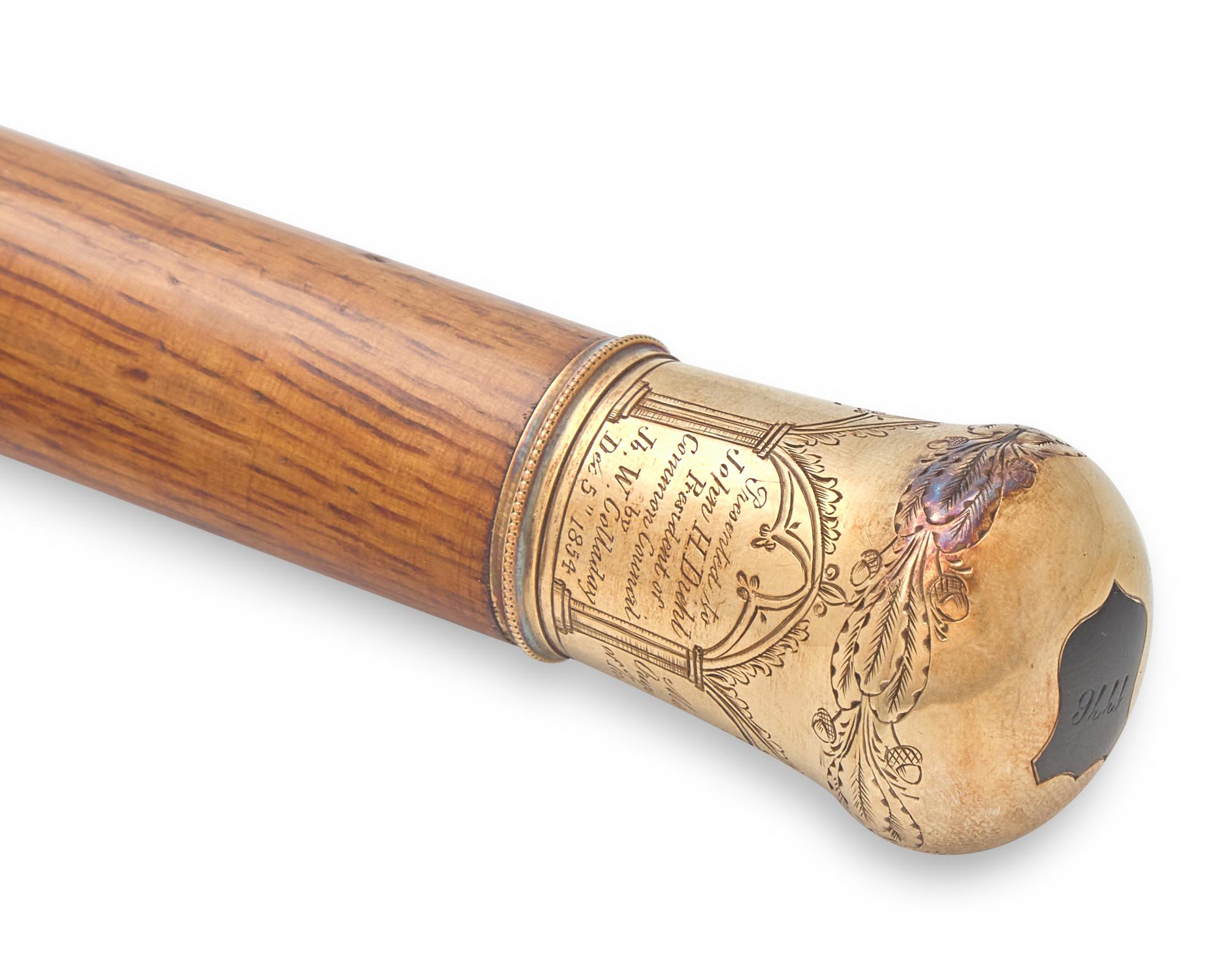 A Gold-Mounted Oak Cane / Walking Stick Made from a Wood Girder From Independence Hall, Philadelphia, PA, by Jacob W. Colladay, Dated "1854"