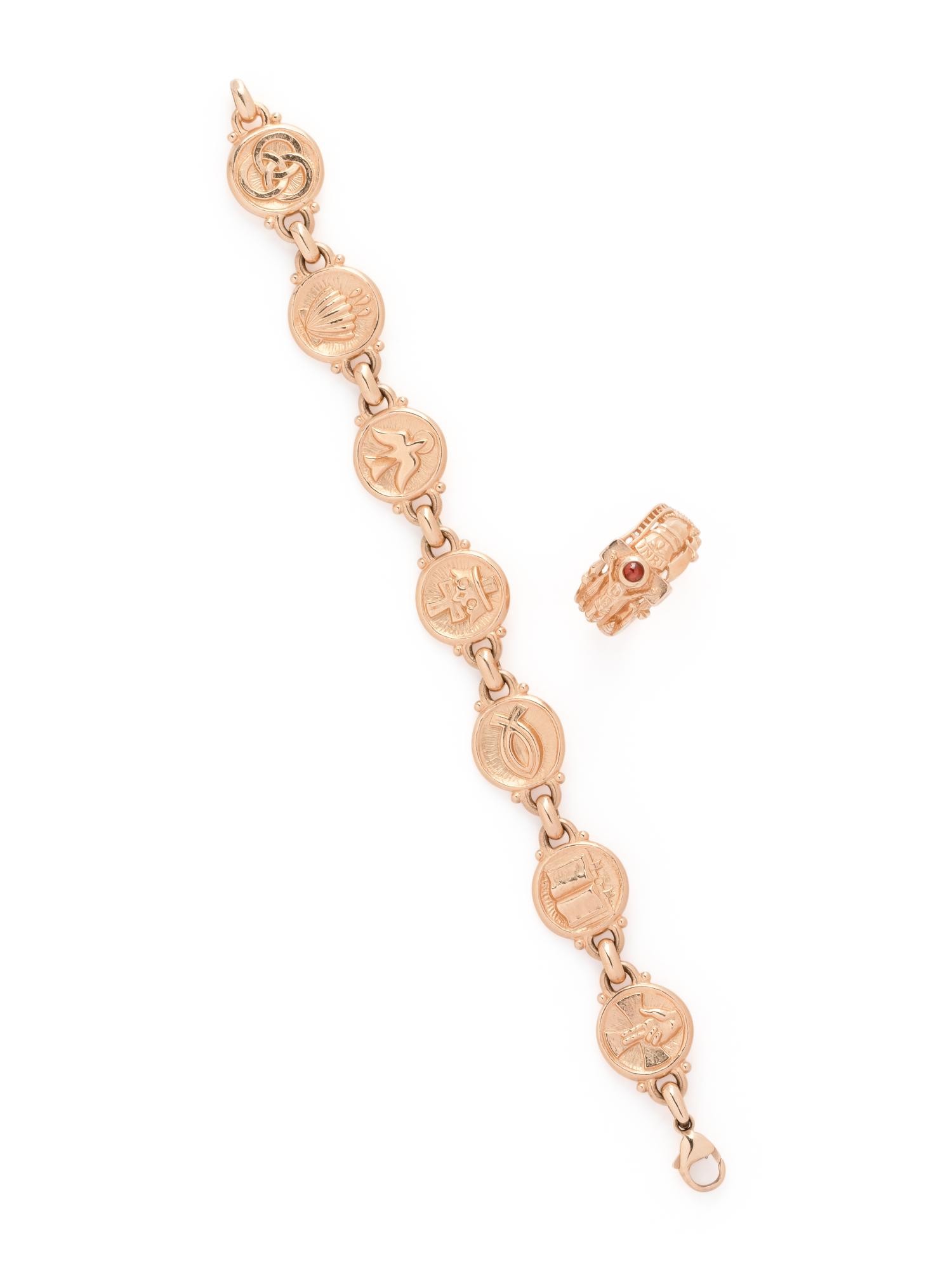 COLLECTION OF YELLOW GOLD RELIGIOUS MOTIF JEWELRY