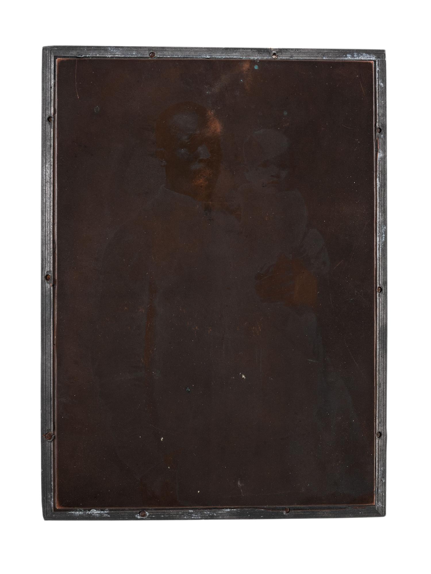 [EARLY PHOTOGRAPHY]. FISHER, AJ, photographer. Printing block for a photograph of an African American butler with white baby.