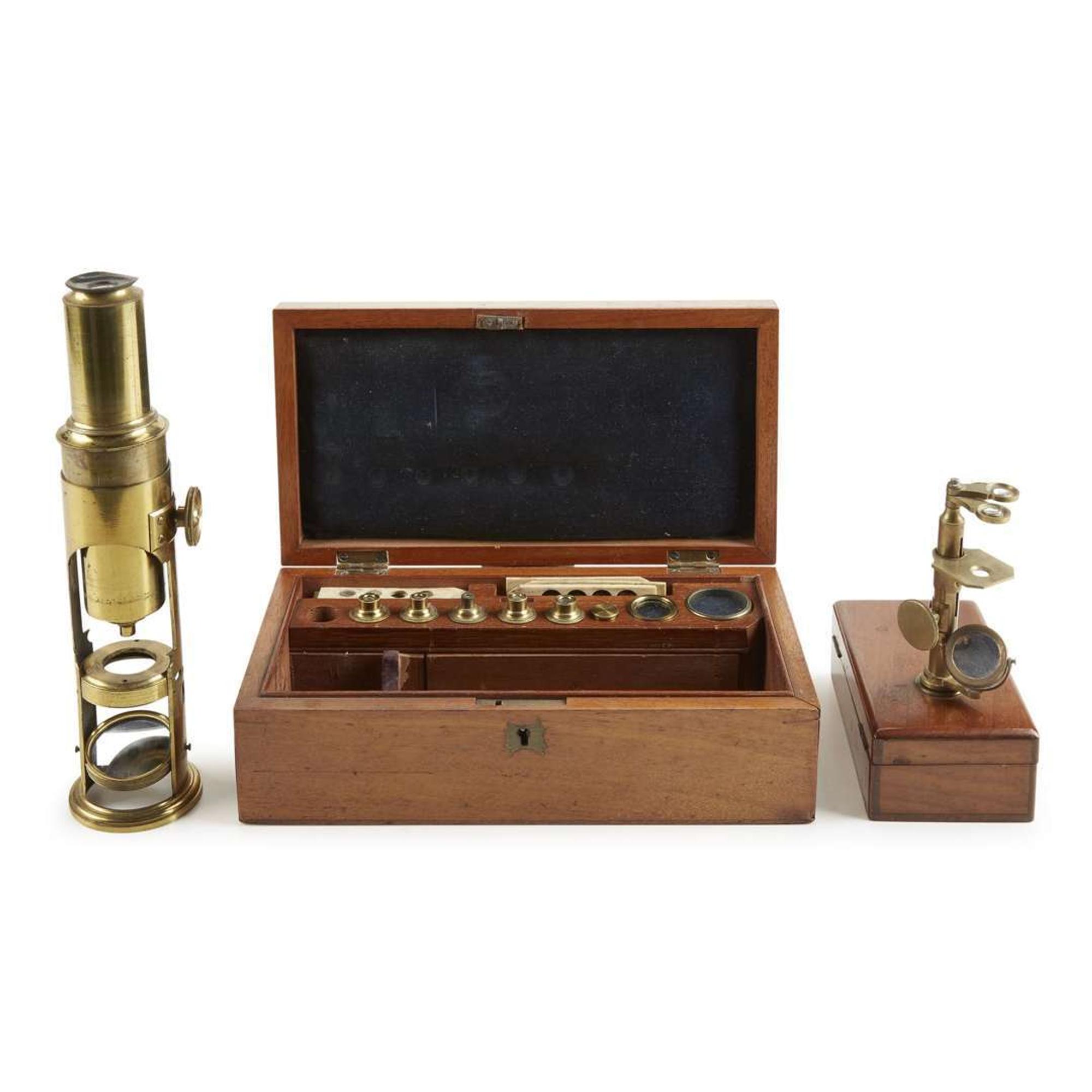 Two small brass compound monocular microscopes and brass-inlaid mahogany traveling boxes circa 1850