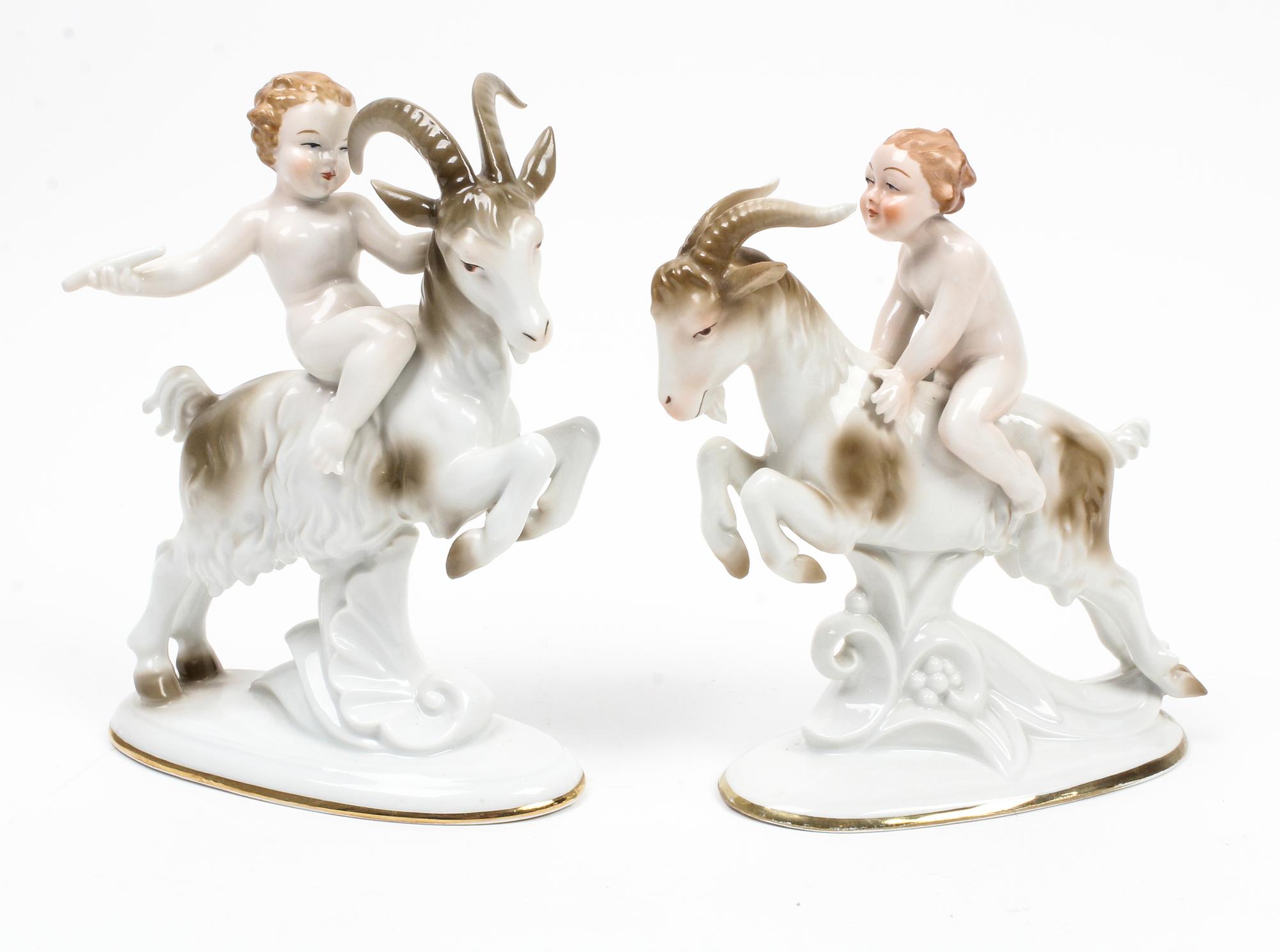Two German Porcelain Figures Height 7 7/8 inches.
