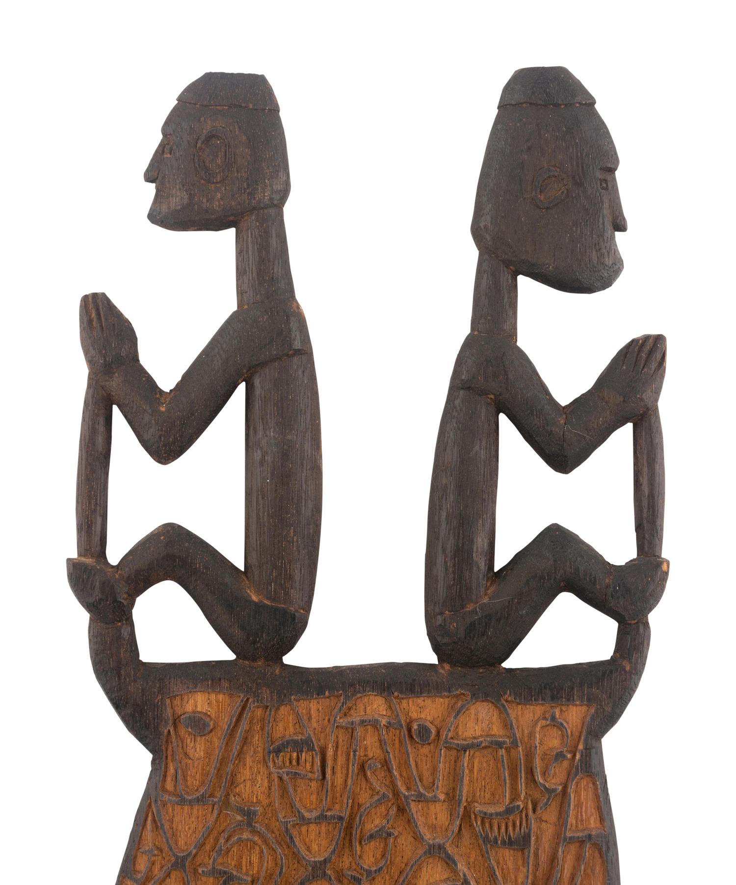 An Asmat Carved Wood Shield
