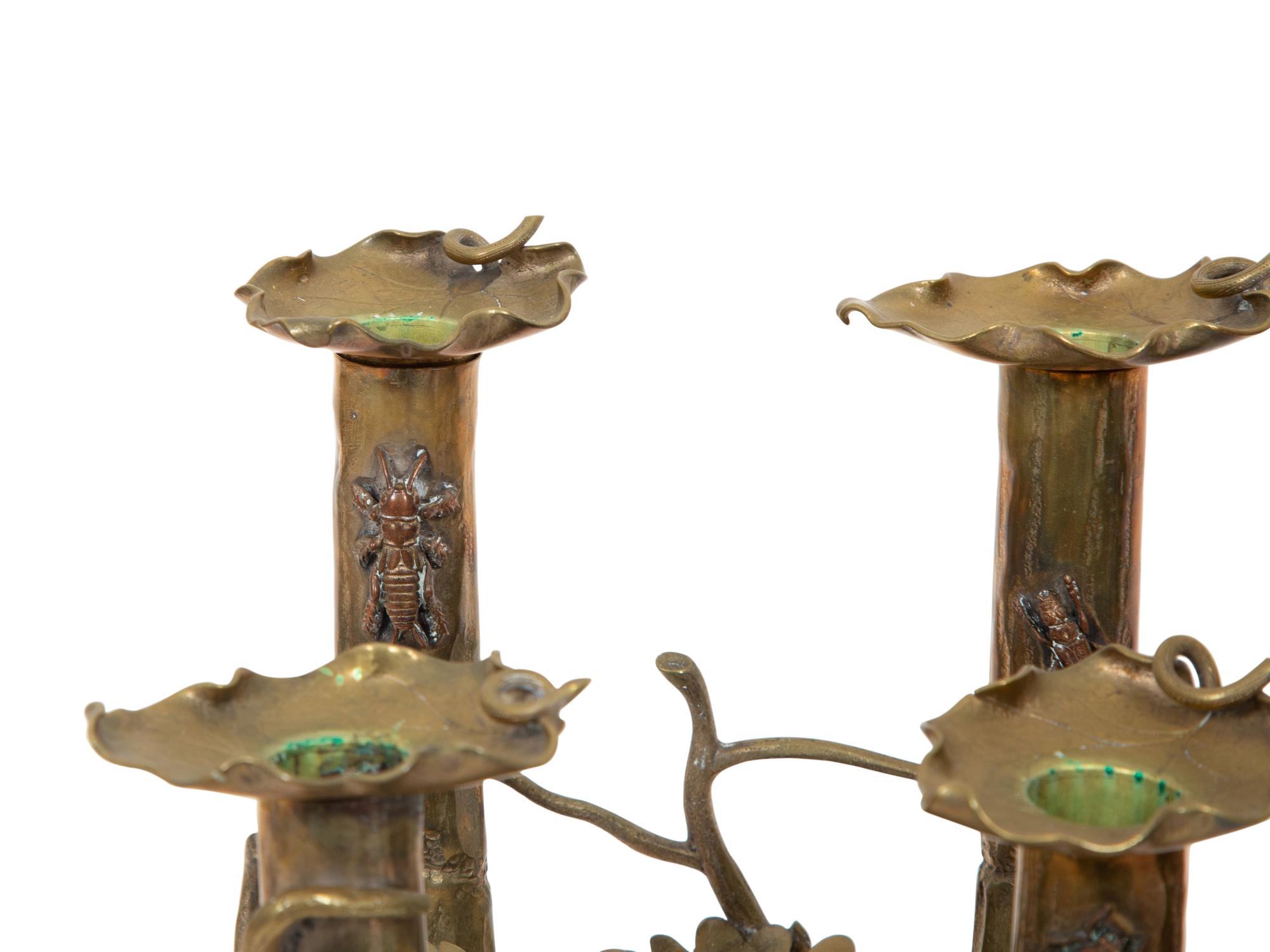 A Pair of Cast Brass Four-Light Candelabra with Birds and Insects