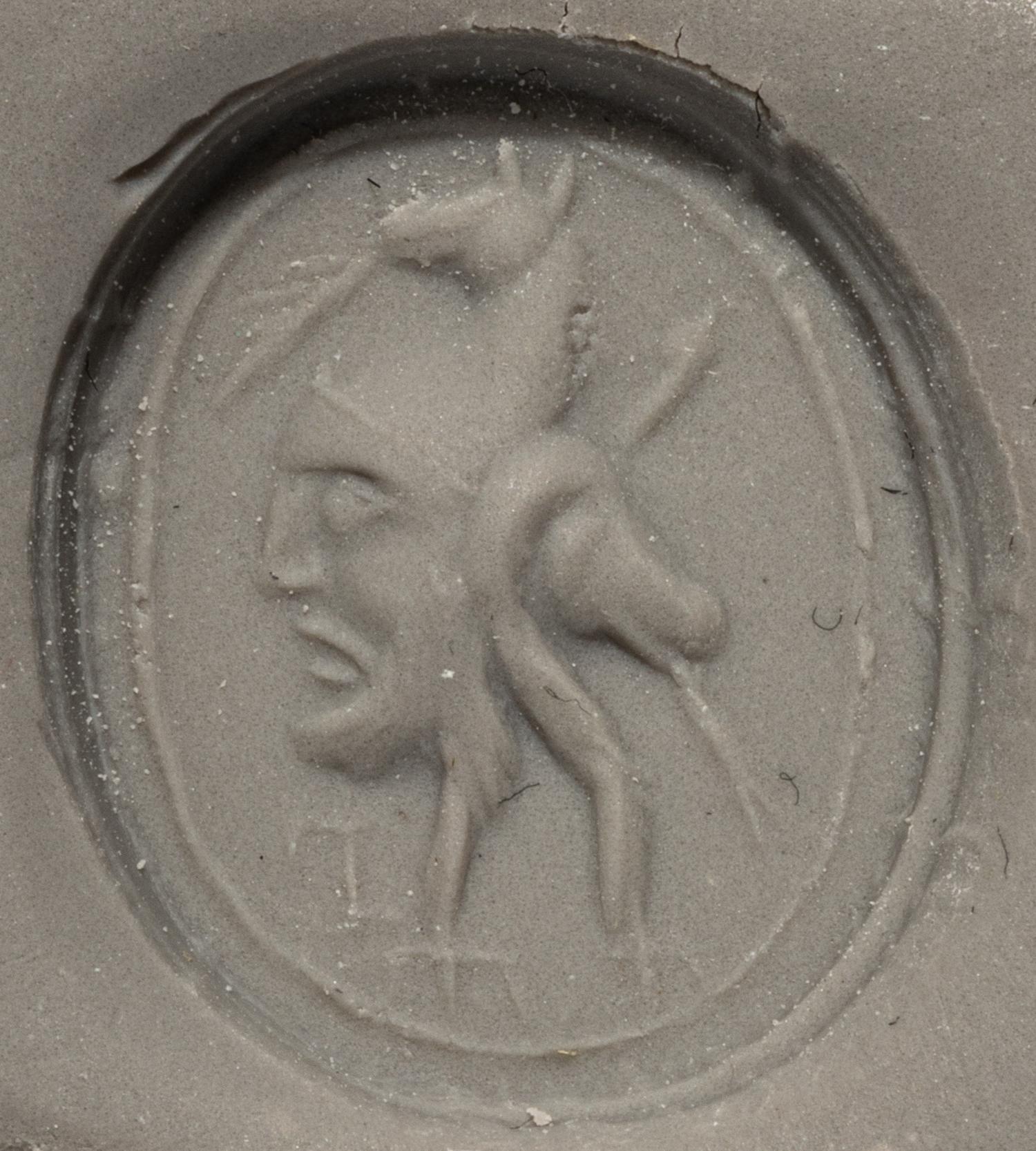 An Etruscan Chalcedony Scarab with a Gryllos