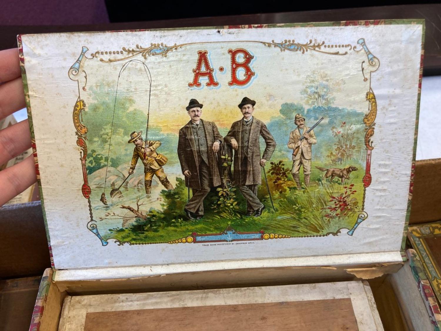 A Collection of Cigar Boxes and Tins