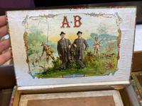 A Collection of Cigar Boxes and Tins