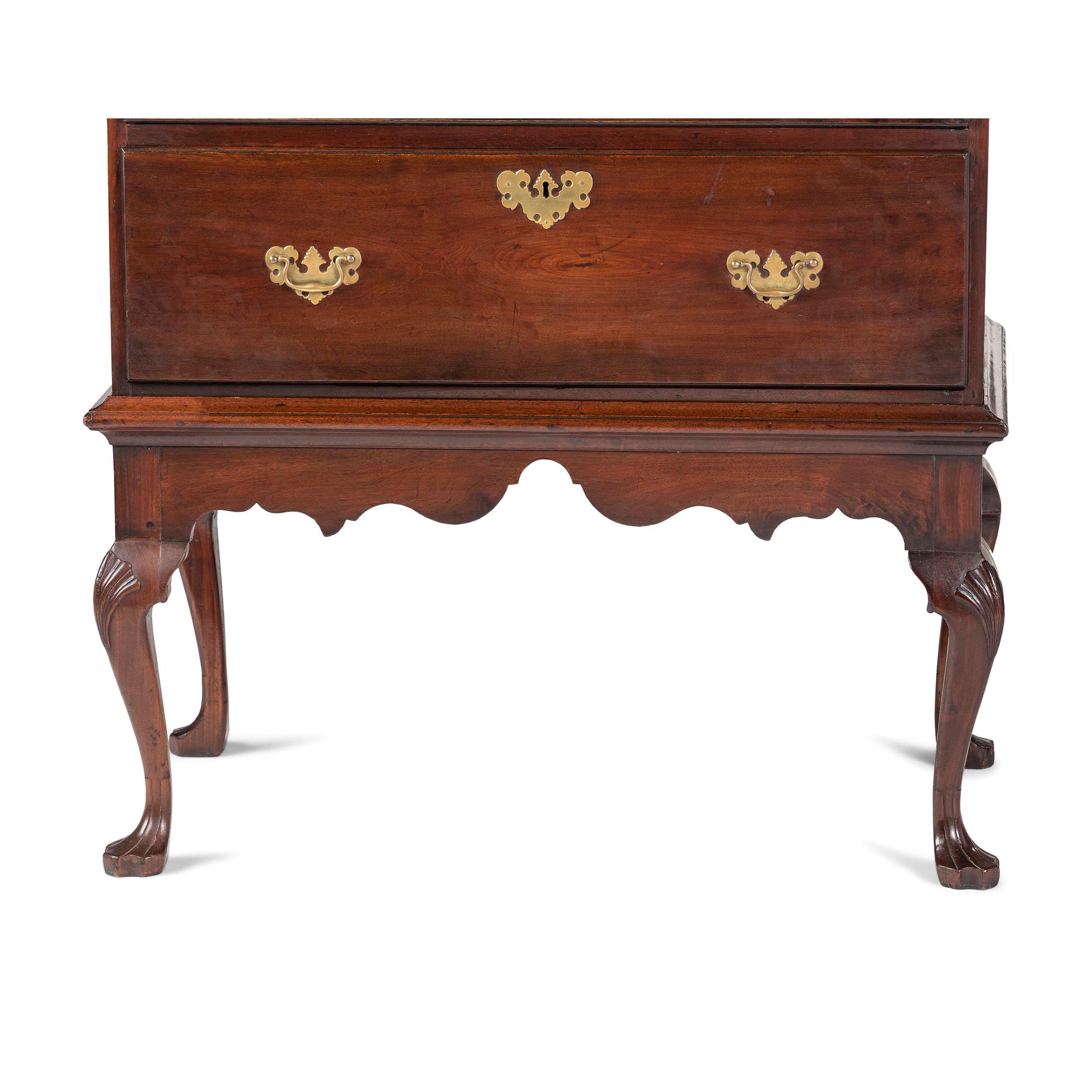 A Chippendale Walnut Shell Carved Flat-Top Chest on Stand
