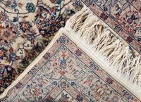 A Kashan Wool Rug
