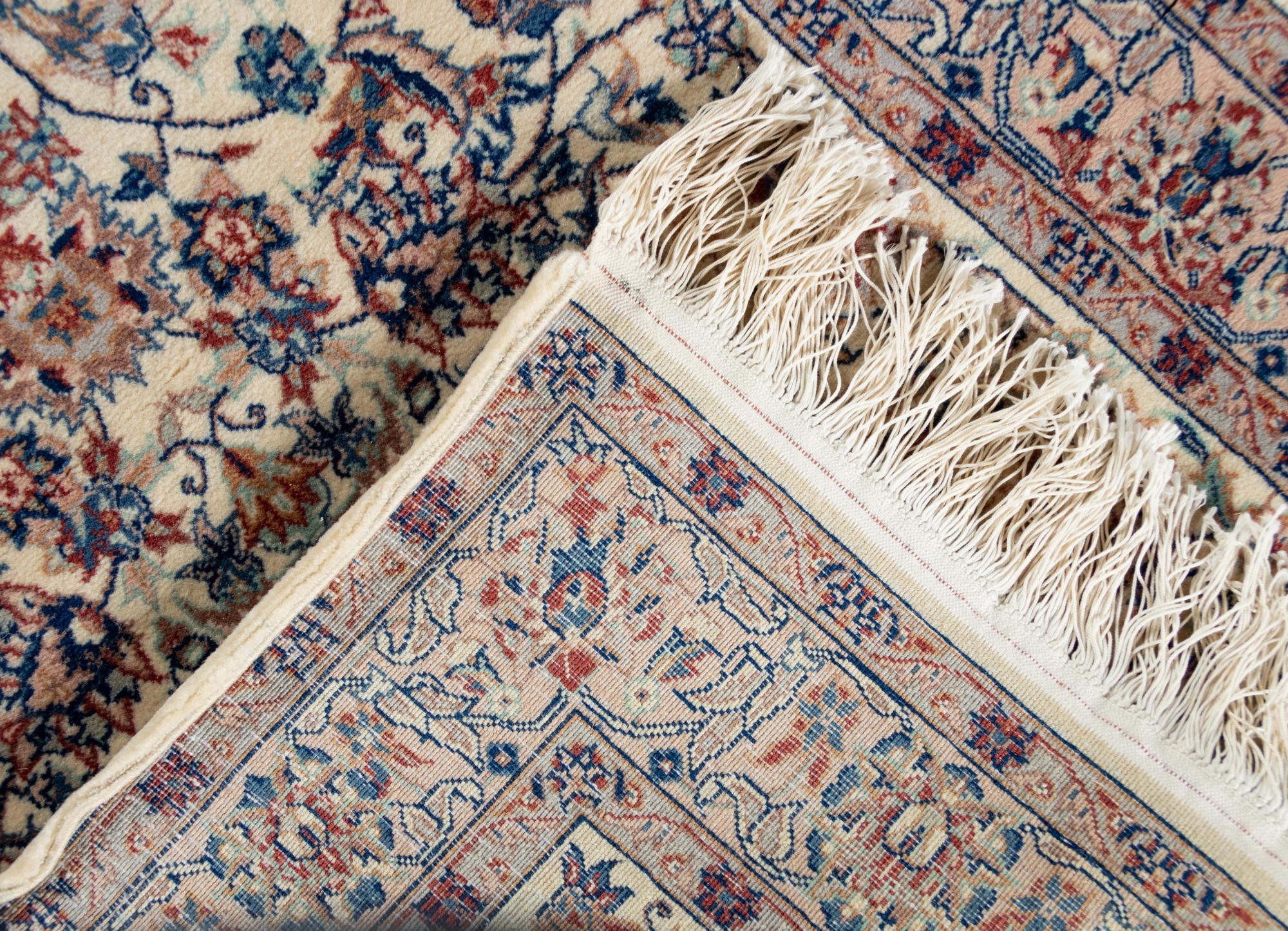 A Kashan Wool Rug