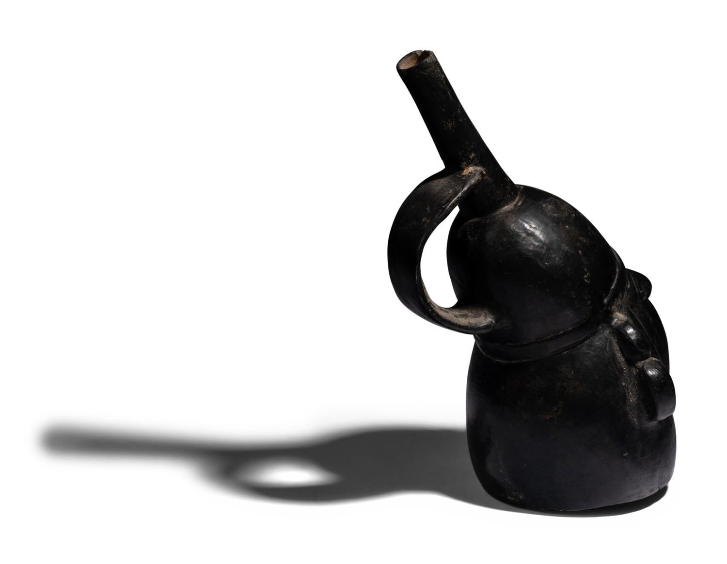 A Chimu Blackware Portrait Vessel