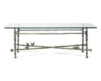 A Giacometti-Style Patinated Bronze and Glass Cocktail Table