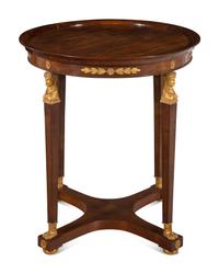An Empire Style Parcel Gilt Mahogany Side Table