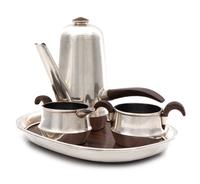 A Mexican Silver Four-Piece Bachelor's Coffee Service, William Spratling, Taxco, Mid-20th Century, comprising a coffee pot, creamer, su