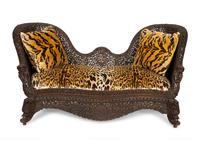Two Similar Anglo-Burmese Carved Teak Settees